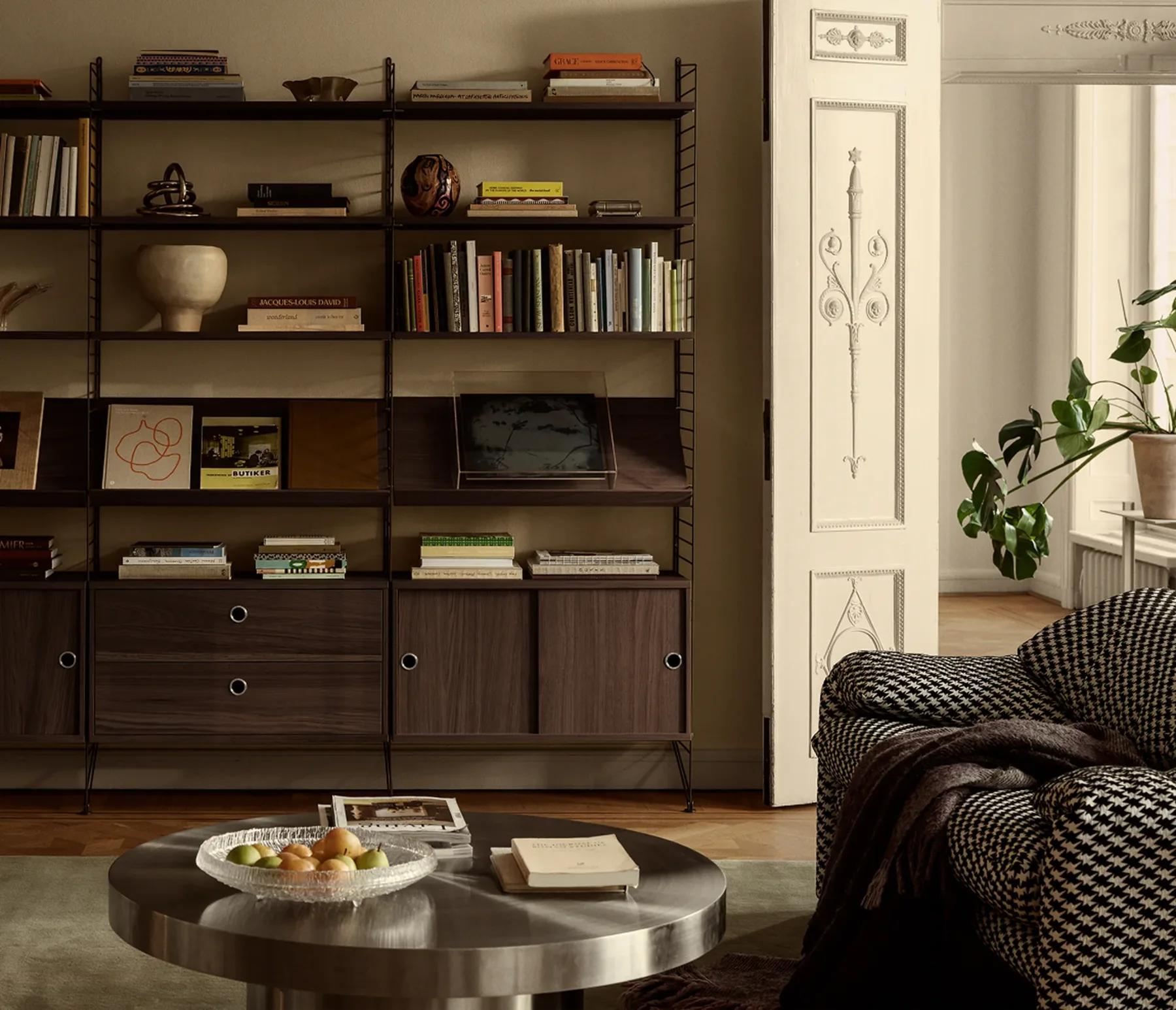 String shelving system in a living room